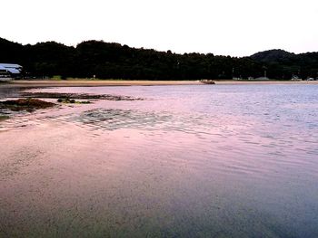 Scenic view of lake against clear sky