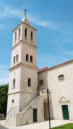 Low angle view of historic building against sky