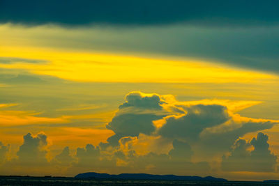 Low angle view of dramatic sky during sunset