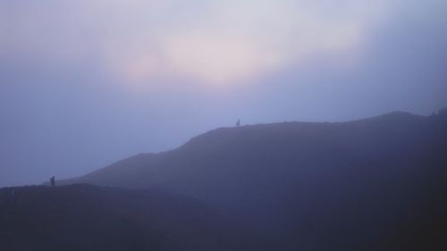 Scenic view of silhouette landscape against sky during sunset