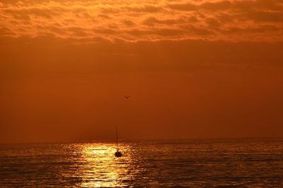 Scenic view of sea at sunset