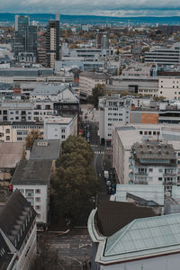 High angle view of street amidst buildings in city