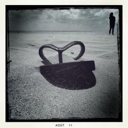 Silhouette of people against sky