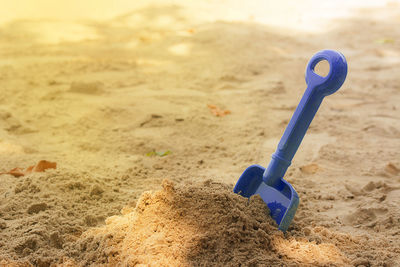 Close-up of toy on sand