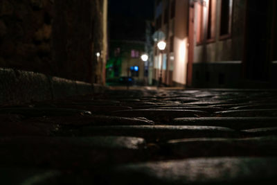 Close-up of illuminated street light in city