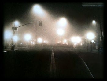 Illuminated street light at night