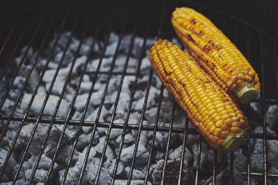 Close-up of corn on barbecue grill