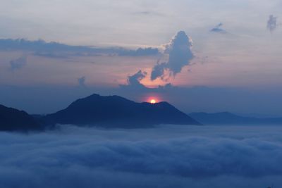 Scenic view of mountains against sky during sunset