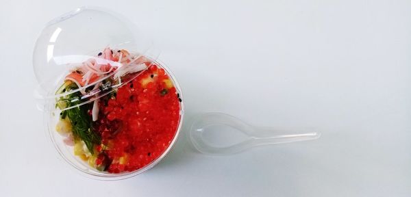 Directly above shot of fruits in glass on table