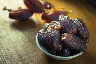 High angle view of fruits in plate on table
