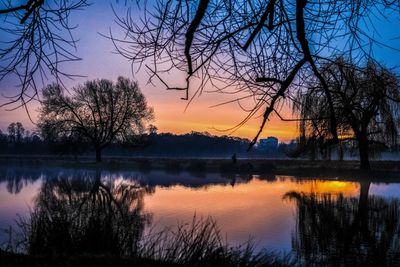 Scenic view of lake during sunset