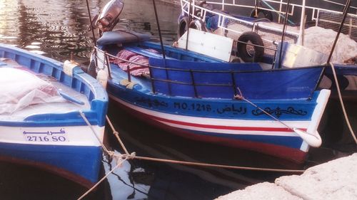 High angle view of fishing boats moored in sea