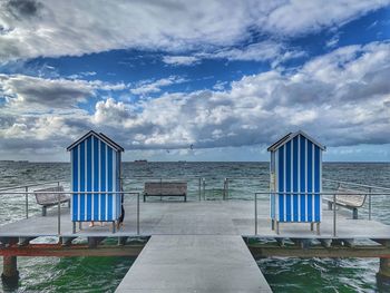 Built structure on beach against sky