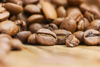 Close-up of coffee beans on table