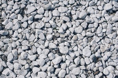 Full frame shot of pebbles on beach