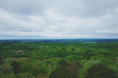 Scenic view of landscape against cloudy sky