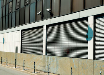 Security cameras on building during sunny day