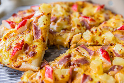 Close-up of pizza served in plate