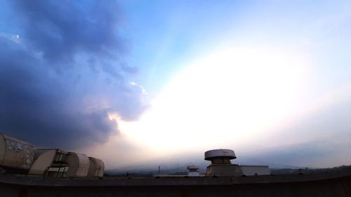 Low angle view of building against sky during sunset