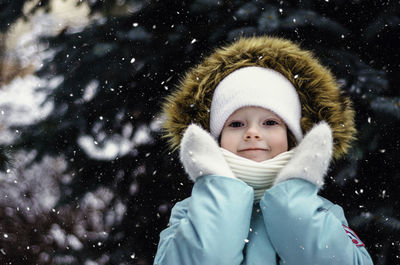 Girl on the open air in the winter.