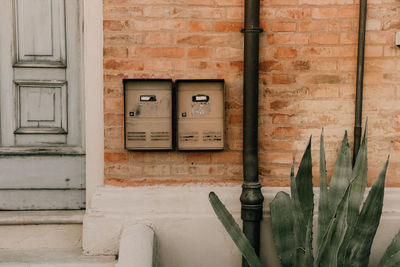 Text on brick wall