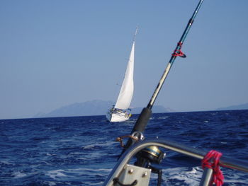 Sailboat sailing in sea