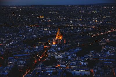 Aerial view of illuminated cityscape at night