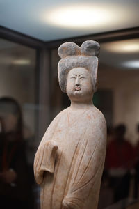 Close-up of statue against temple