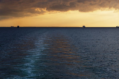 Scenic view of sea against sky during sunset