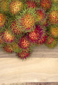 High angle view of strawberries on table