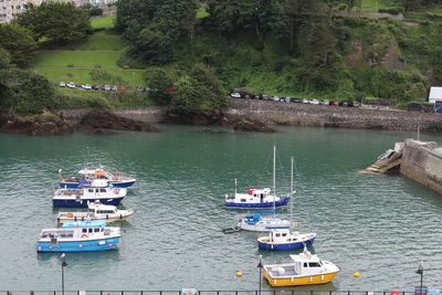 High angle view of boats moored in river against sky