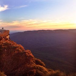 Scenic view of landscape against sky during sunset