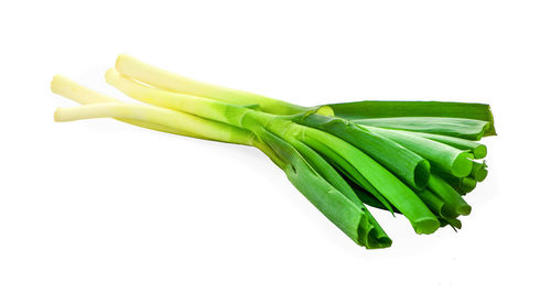 Close-up of green pepper against white background