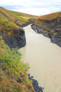 High angle view of river amidst rocks