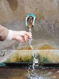 Person hand pouring water