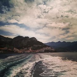 Scenic view of sea against cloudy sky