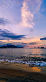 Scenic view of beach against sky during sunset