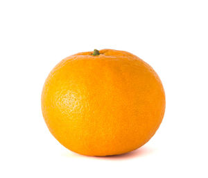 Close-up of orange slice against white background