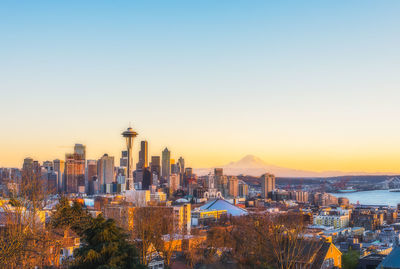 High angle view of buildings against sky during sunset