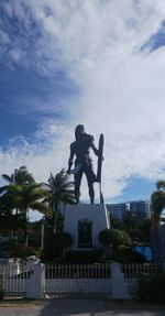 Low angle view of statue against sky