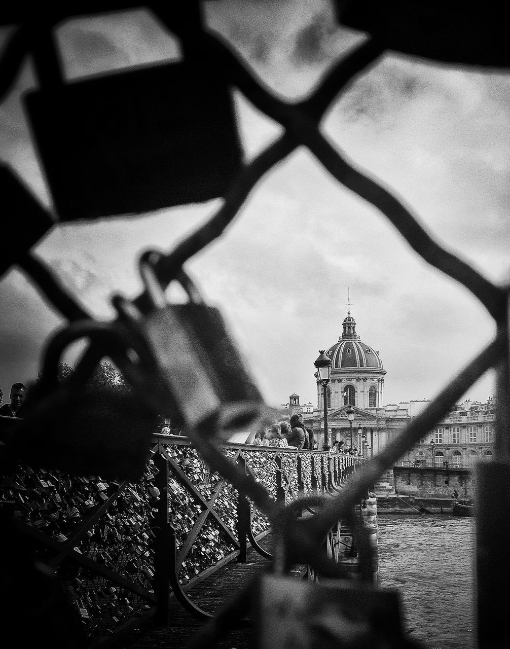 architecture, built structure, building exterior, religion, place of worship, railing, spirituality, sky, church, selective focus, focus on foreground, gate, outdoors, sunlight, day, focus on background, no people, history