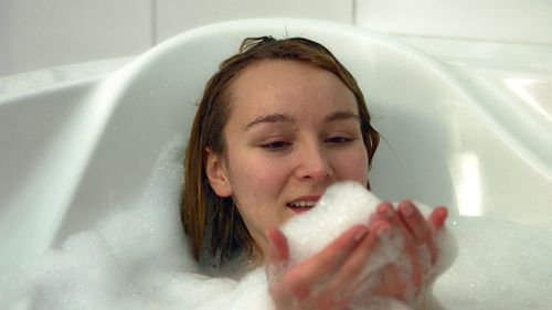 Portrait of man in bathtub