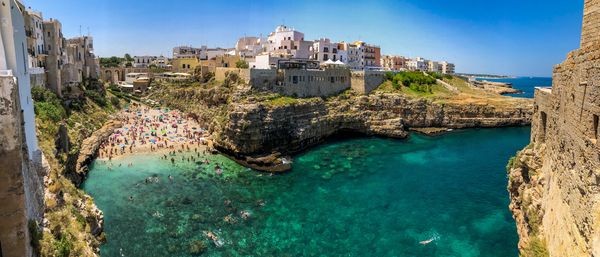 High angle view of buildings by sea