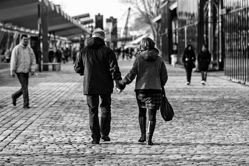 PEOPLE WALKING ON STREET DURING WINTER