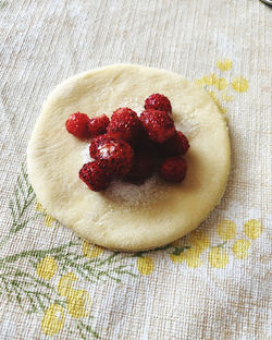 High angle view of strawberries on table