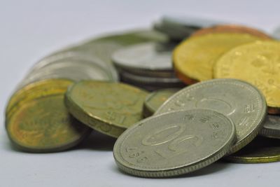 Close-up of coins on table