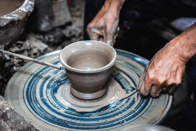 Midsection of person working