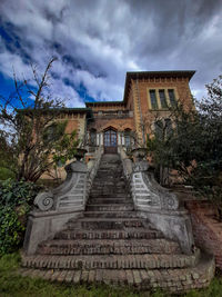 Low angle view of old building against sky