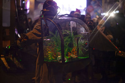 Close-up of person with artificial equipment in event