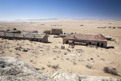 Scenic view of desert against clear sky